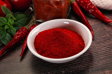 Spicy dry paprika powder in the bowl