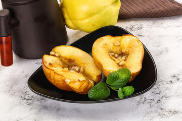 Baked quince with honey and cedar