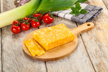 Marble yellow cheese with slices