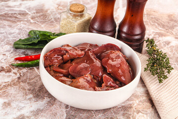 Raw uncokked chicken liver in the bowl
