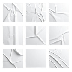 Textured white paper squares with folds and creases arranged in a grid pattern