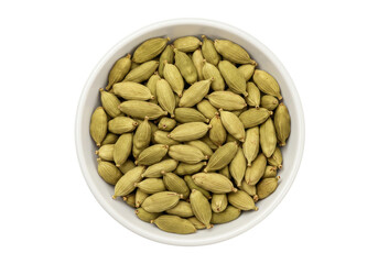 Isolated bowl of green cardamom pods viewed from above, organic culinary spice ingredient