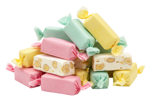 Isolated pile of pastel-wrapped saltwater taffy nougat candies in pink yellow and green colors