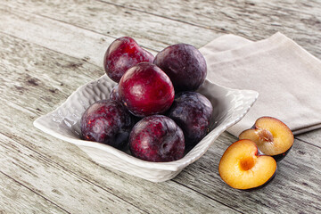 Ripe sweet juicy plum heap