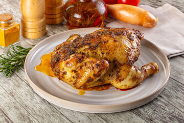 Baked in oven whole chicken with spices