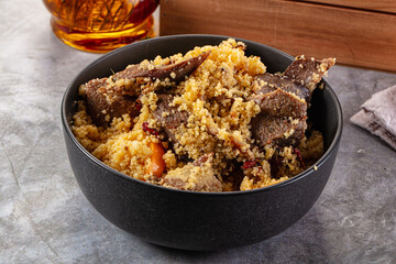 Traditional couscous with lamb and vegetables