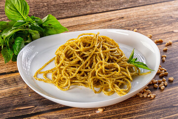 Italian green pasta with pesto sauce
