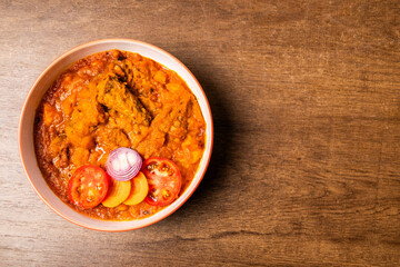 Mpotompoto, Mashed Yam or Potato Cooked into a Thick Porridge with Palm Oil, Tomatoes, Onions, Dried Fish, and Tuna, a Traditional Ghanaian Dish from West Africa