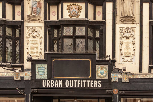 Urban Outfitters shop in Kingston Upon Thames, Logo of the fashion brand  on an old building in centrum of Kingston, London town.