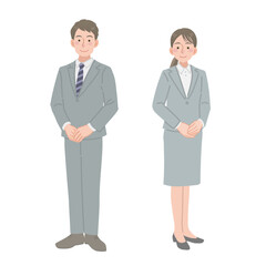 スーツを着た男女の立ち姿