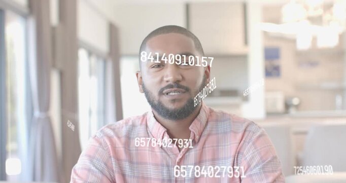 Man sitting beginning speech, launching digital numbers representing data orbiting head then fading