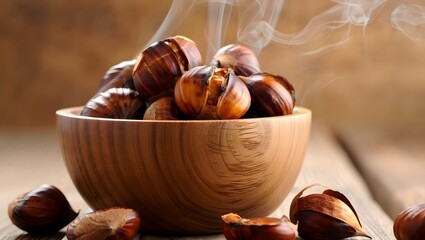 Roasted chestnuts in a wooden bowl on a wooden table