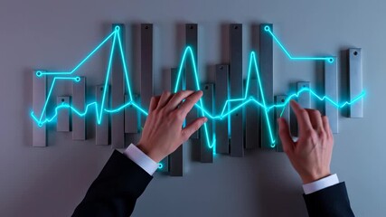 Man interact with a virtual glowing blue line graph that changes over time on a gray background, business growth concept footage. - Powered by Adobe
