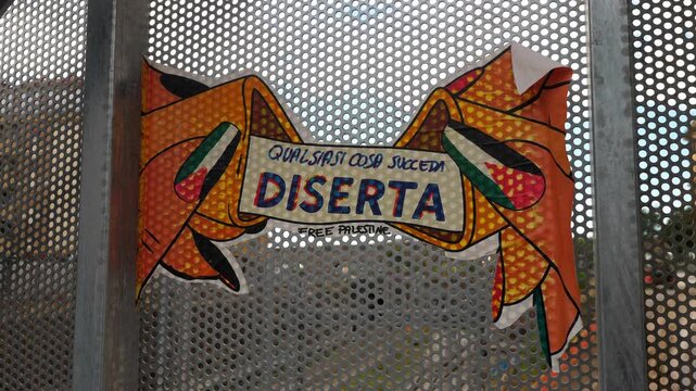 Rome, October 2, 2025: Street art poster reading &ldquo;Whatever happens, desert&rdquo; &mdash; a poetic protest reflecting loss, war, and identity.