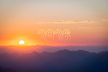 Sunset over mountains with 2026 text in sky