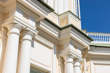 Obraz premium Classic architecture, yellow white building exterior design. Pillars and walls