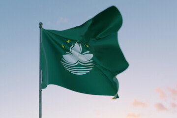 National flag of Macau waving in the wind against a clear sky, symbolizing patriotism, independence, national pride, and unity.