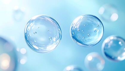 Two translucent blue spheres float in water, with several smaller bubbles