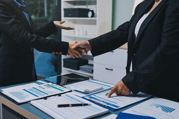 Business handshake for teamwork of business merger and acquisition,successful negotiate,hand shake,two businessman shake hand with partner to celebration partnership and business deal concept