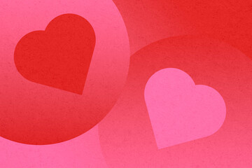 Red heart shapes on textured background symbolizing love and romance