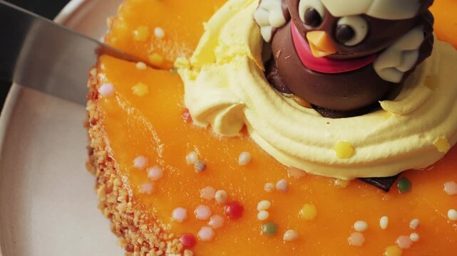 La mona de pascua is a traditional Spanish dessert, eaten primarily during Holy Week and especially on Easter Monday. It consists of a sweet, traditionally a roscon or sponge cake, decorated with