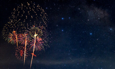 Fireworks with blur milky way background