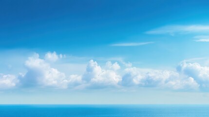 Fototapeta premium Glistening Sea Surface Under a Clear Blue Sky—An Endless Stretch of Ocean Shimmering Brightly in Sunlight, Crafting a Serene, Breathtaking Coastal View Ideal for Wallpapers, Travel Graphics