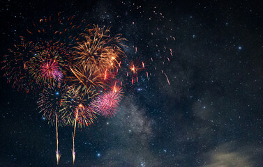 Fireworks with blur milky way background