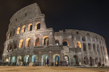 Naklejka premium The Colosseum Illuminated at Night in Rome, Italy