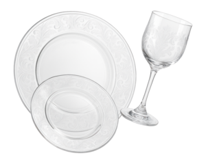 Elegant etched glass dinnerware set, perfect for upscale dining in a penthouse.