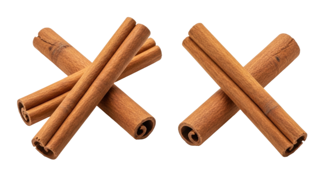 Isolated cinnamon sticks create a visually appealing crossed design popular for holiday use