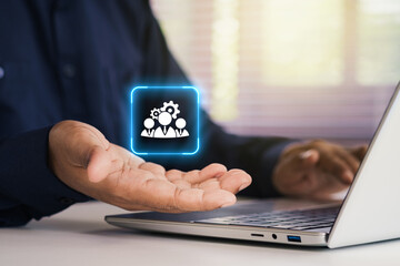 Human Resource Technology. Team Management Concept. Hand Holding Digital HR and system Icon with...