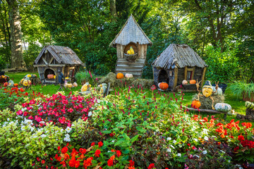 Autumn pumpkins decoration in park, garden, patio or terrace