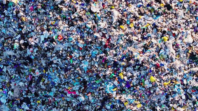 Sunrise drone shot of landfill symbolizing waste crisis and circular economy