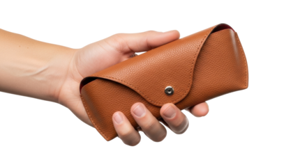 Isolated hand holding brown leather eyewear case, stylish spectacles protector design