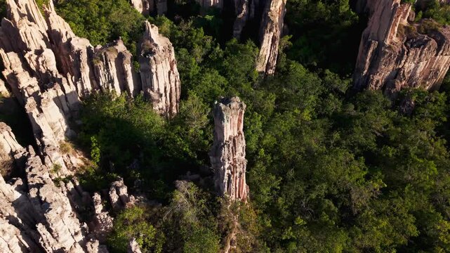 circle pan high angle aerial drone shot showing the stunning rock formations of los estoraques in colombia