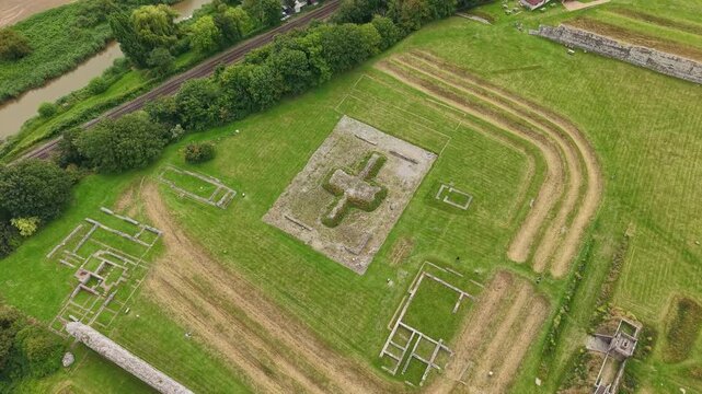Aerial view showing foundations of a Roman monumental arch and buildings at Richborough Roman Fort.