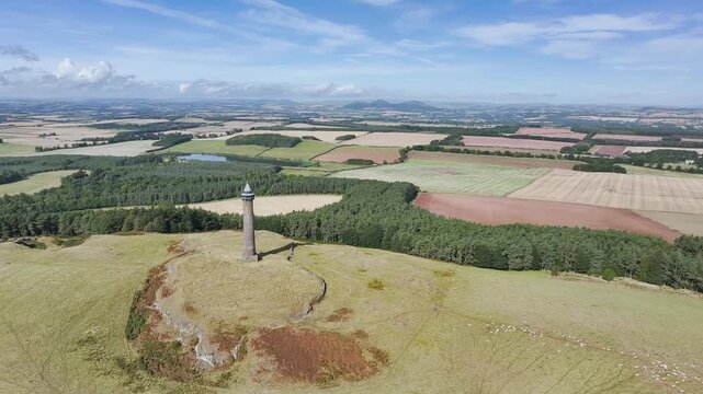 Waterloo Monument over Scottish fields and farms from a drone, Jedburgh, Scotland, UK