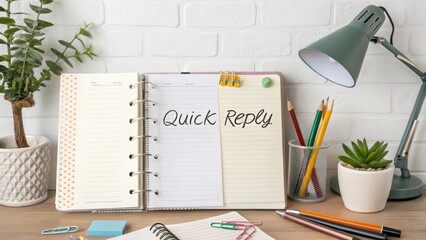 Notebook with Quick Reply Text and Stationery Items on Desk