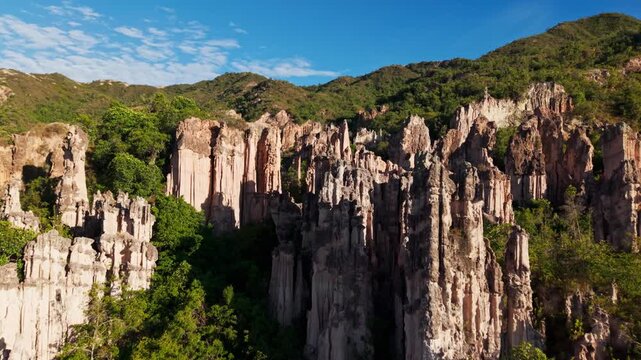 Aerial forward shot of los estoraques unique natural area in norte de santander, colombia