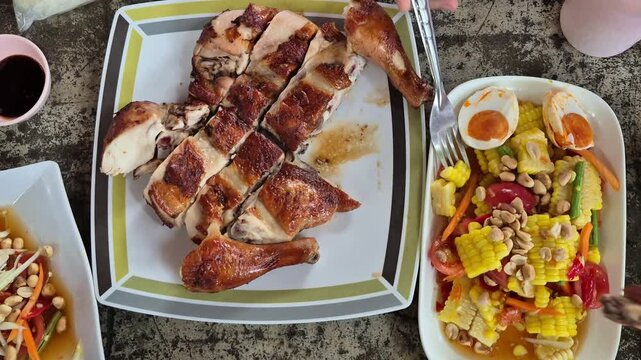 Thai food Esan Northeast famous somtum grill chicken and papaya salad top view