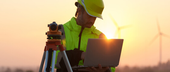 Civil engineers inspect wind farms, power generation systems, natural industry and environmental concepts, clean energy