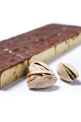 Chocolate pistachio nougat bar isolated on white background