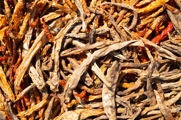 Red chilli pepper spices for sale on a spice market in India, fresh ingredients for cooking indian spicy food masala