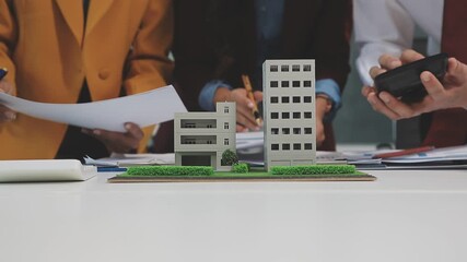 Closeup group Asia businesspeople talk ESG strategies risk management workshop, SDGs report, global warming, green finance investment eco friendly and net zero waste in boardroom training building. - Powered by Adobe