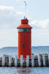 Red beacon at the Baltic Sea port of Hou, Denmark