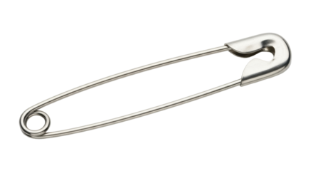 Isolated Metal safety pin on display used for garment sewing together or baby diapers