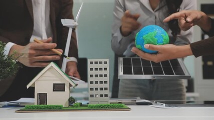 Closeup group Asia businesspeople talk ESG strategies risk management workshop, SDGs report, global warming, green finance investment eco friendly and net zero waste in boardroom training building.