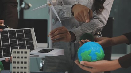 Closeup group Asia businesspeople talk ESG strategies risk management workshop, SDGs report, global warming, green finance investment eco friendly and net zero waste in boardroom training building.