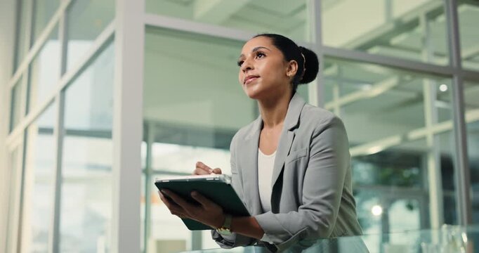 Thinking, businesswoman and writing on tablet in office for draft feedback, story revision or notes. Low angle, stylus and editor with tech at agency for article evaluation, decision or blog approval